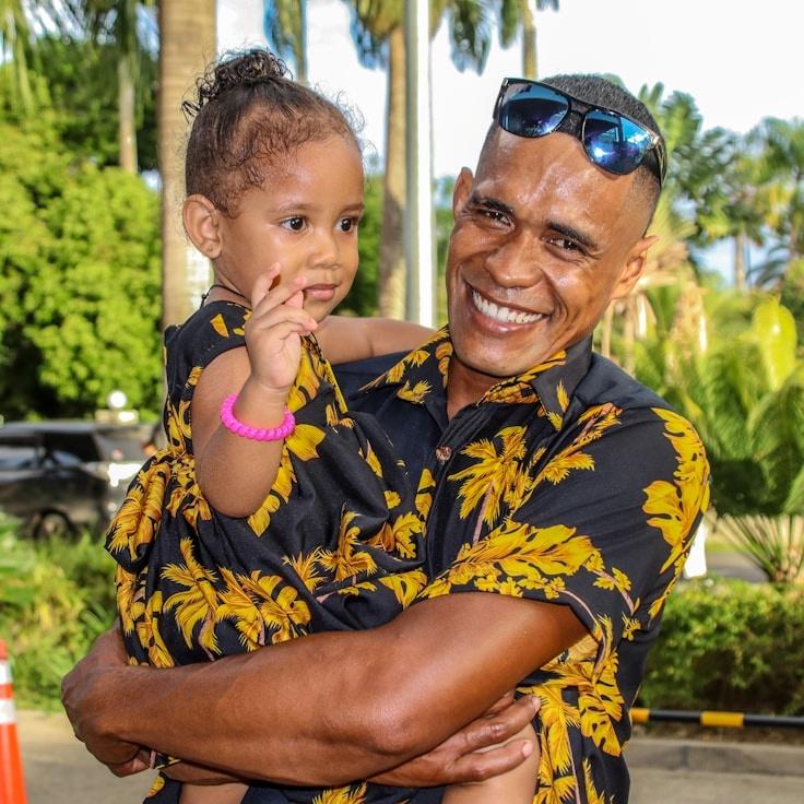 Ava Rana, Lead Design Curator at Astroni Vemica, reviewing corporate floral arrangements